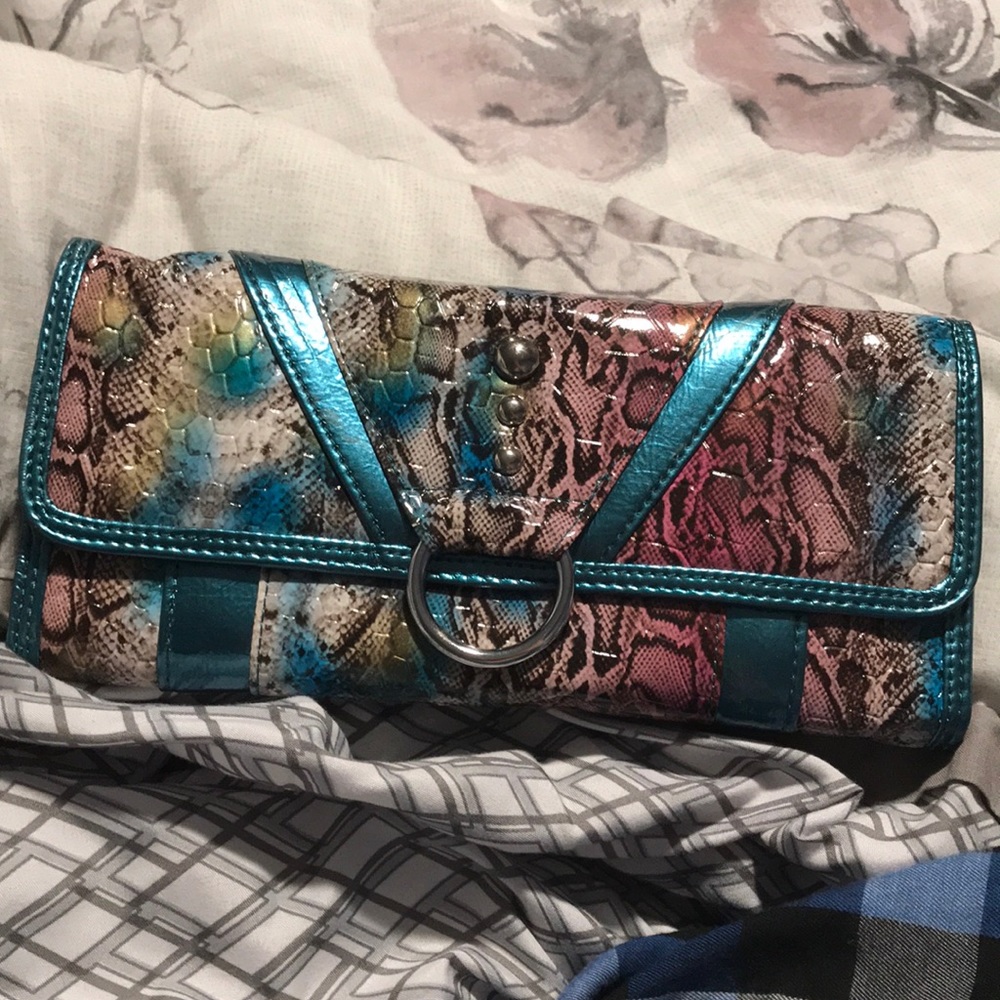 This clutch is super cute and even holds a phone.